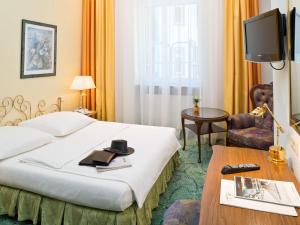 Postel nebo postele na pokoji v ubytování Hotel Palmenhof