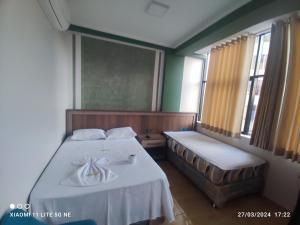 Łóżko lub łóżka w pokoju w obiekcie casa sol residencial