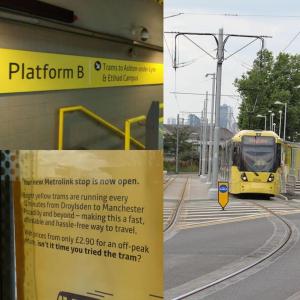 un treno giallo sui binari con un cartello accanto di The Upside down House near Coop Live Arena , Etihad and Mcr City Centre a Manchester