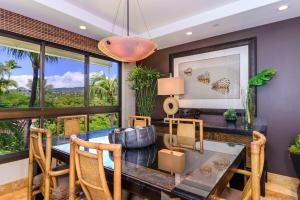 a dining room with a table and chairs at Kaanapali Alii 456 in Kaanapali