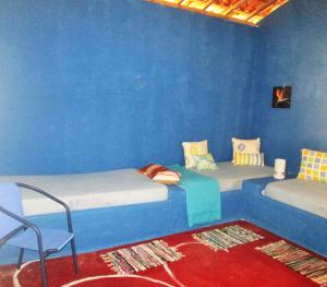Postelja oz. postelje v sobi nastanitve Natal Casa de Playa en Pitangui‏