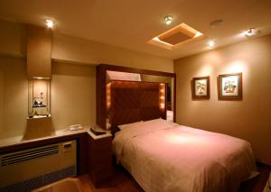 Katil atau katil-katil dalam bilik di HOTEL ｍ