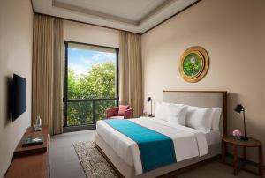 Letto o letti in una camera di Storii By ITC Hotels Devasom Resort & Spa, Kolkata