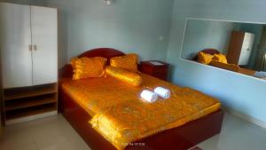 Voodi või voodid majutusasutuse Mabuhay Guesthouse Kampot toas