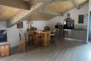 Kuchyň nebo kuchyňský kout v ubytování Loft ravissant avec spa nordique