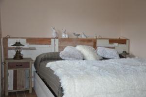 A bed or beds in a room at Podere San Cassiano