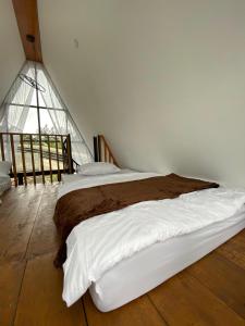 Łóżko lub łóżka w pokoju w obiekcie Zaa Villa