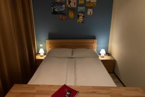 Postel nebo postele na pokoji v ubytování Pension a und a