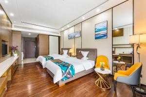 Poly Pivot International Aparthotel Guangzhou East Railway Branch - Free Shuttle Bus to Canton Fair Complex During Canton Fair Period客房内的一张或多张床位