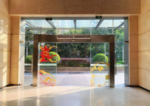 Poly Pivot International Aparthotel Guangzhou East Railway Branch - Free Shuttle Bus to Canton Fair Complex During Canton Fair Period的门面或入口