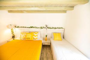 Postel nebo postele na pokoji v ubytování Opus apartment