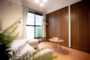 Χώρος καθιστικού στο Guest House UMEDA