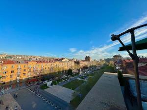 a view of a city with buildings and a street at TOUCH THE SKY Apartment in Yerevan
