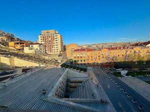 a view of a city with buildings and a street at TOUCH THE SKY Apartment in Yerevan