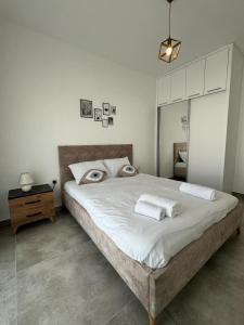 Postel nebo postele na pokoji v ubytování Caesar Resort & SPA Commodus