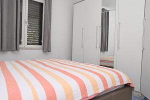 Postel nebo postele na pokoji v ubytování Apartment Oscar
