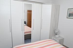 Postel nebo postele na pokoji v ubytování Apartment Oscar