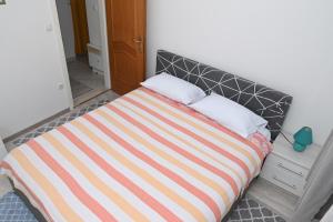 Postel nebo postele na pokoji v ubytování Apartment Oscar