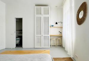 Jardin Rooms客房内的一张或多张床位