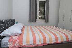 Postel nebo postele na pokoji v ubytování Apartment Oscar