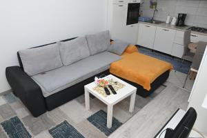 Posezení v ubytování Apartment Oscar