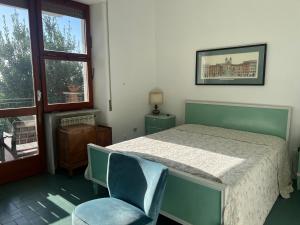 A bed or beds in a room at Casa del sole