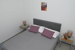 Postel nebo postele na pokoji v ubytování Apartment Oscar