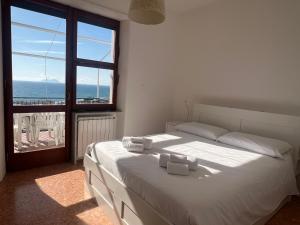 A bed or beds in a room at Casa del sole