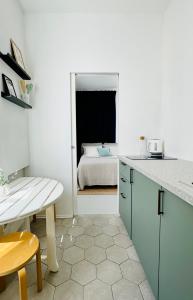 Jardin Rooms的厨房或小厨房