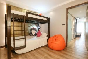 Ένα ή περισσότερα κρεβάτια σε δωμάτιο στο Citrus Suites Sukhumvit 6 by Compass Hospitality