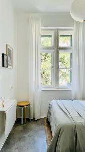 Jardin Rooms客房内的一张或多张床位