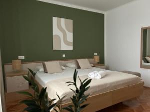 Postel nebo postele na pokoji v ubytování Perina Apartment - free parking