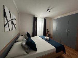 Postel nebo postele na pokoji v ubytování Perina Apartment - free parking