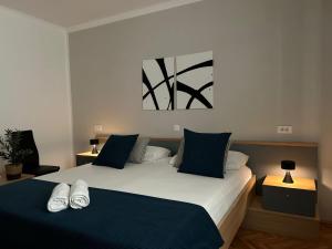 Postel nebo postele na pokoji v ubytování Perina Apartment - free parking