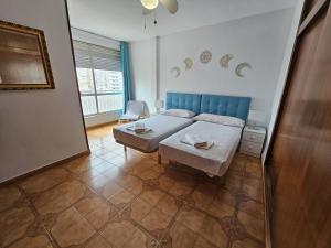 Posteľ alebo postele v izbe v ubytovaní Apartamento Edificio Ilice -9