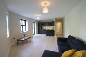 a living room with a couch and a table at Inviting 2-Bed Apartment in Dublin in Dublin