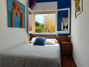 Posteľ alebo postele v izbe v ubytovaní Apartamento con jardín a 11 metros de la playa. B1.