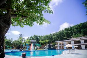 a pool at a resort with a water park at Bang Onsen Spa & Resort in Bang