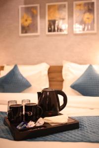 Χώρος καθιστικού στο Gallivanto Inn - Rohini