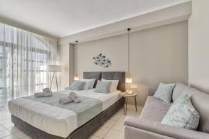 Katil atau katil-katil dalam bilik di Contessa Hotel