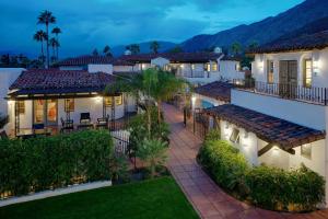 an aerial view of a house at night at Triada Palm Springs, Autograph Collection in Palm Springs