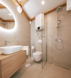 Ein Badezimmer in der Unterkunft Mascheroni Luxury Rooms