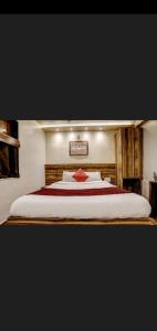 Łóżko lub łóżka w pokoju w obiekcie Hotel Green Park