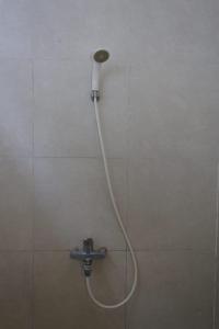 Et badeværelse på OYO 93831 Penginapan Cisauk