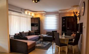 Zona de estar de Apartman Lara