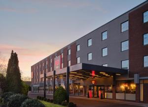 a large building with a building at Radisson RED London Gatwick Airport in Crawley