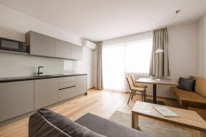 Kuchyň nebo kuchyňský kout v ubytování Hotel & Residence Rebhof