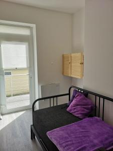 Postel nebo postele na pokoji v ubytování Apartmán U vody