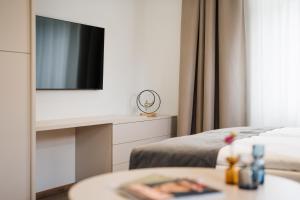 Postel nebo postele na pokoji v ubytování NOBILIS RESIDENCE