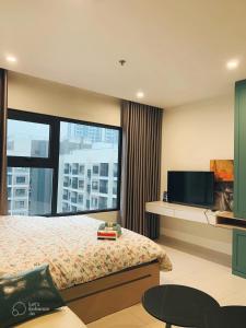 Ένα ή περισσότερα κρεβάτια σε δωμάτιο στο Homestay Ocean Park full đồ xịn đẹp S108 T26